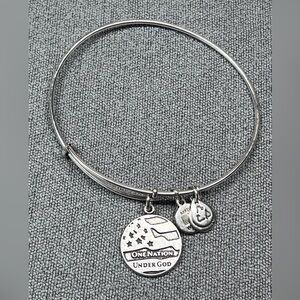 Alex and Ani silver tone bangle bracelet with One Nation Under God charm.